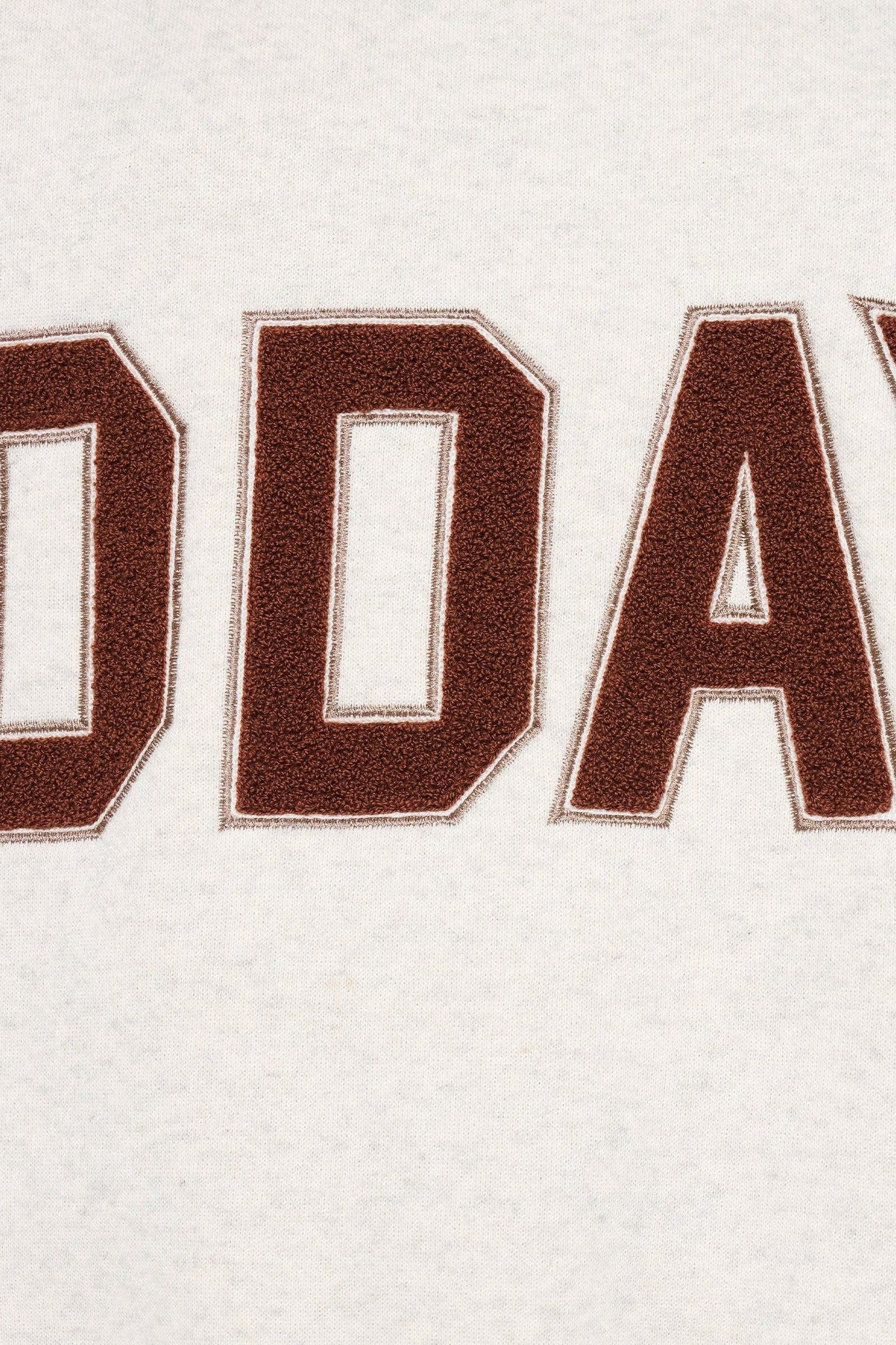 STATEMENT SWEATER LOGO