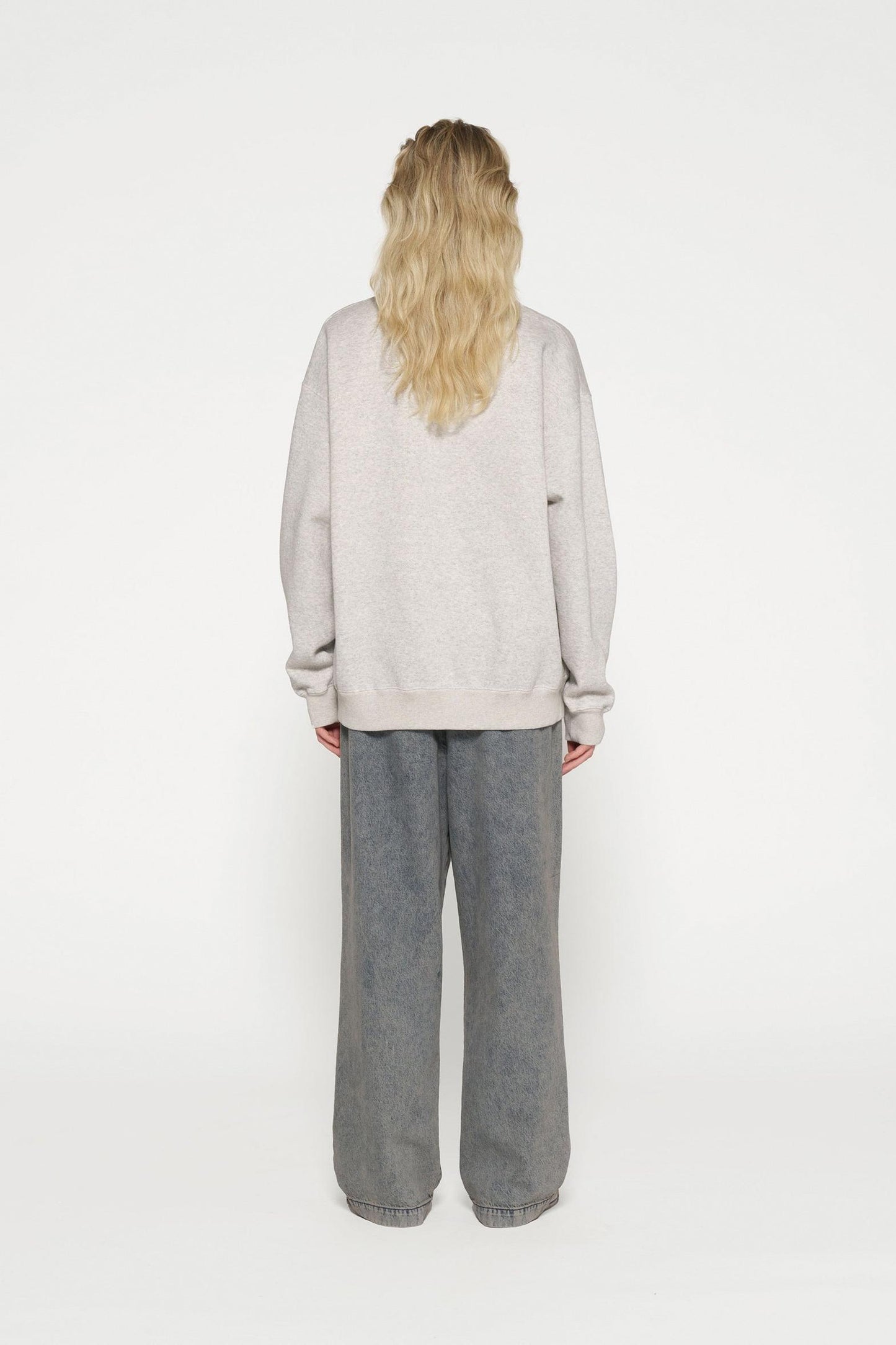 RAW EDGE STATEMENT SWEATER