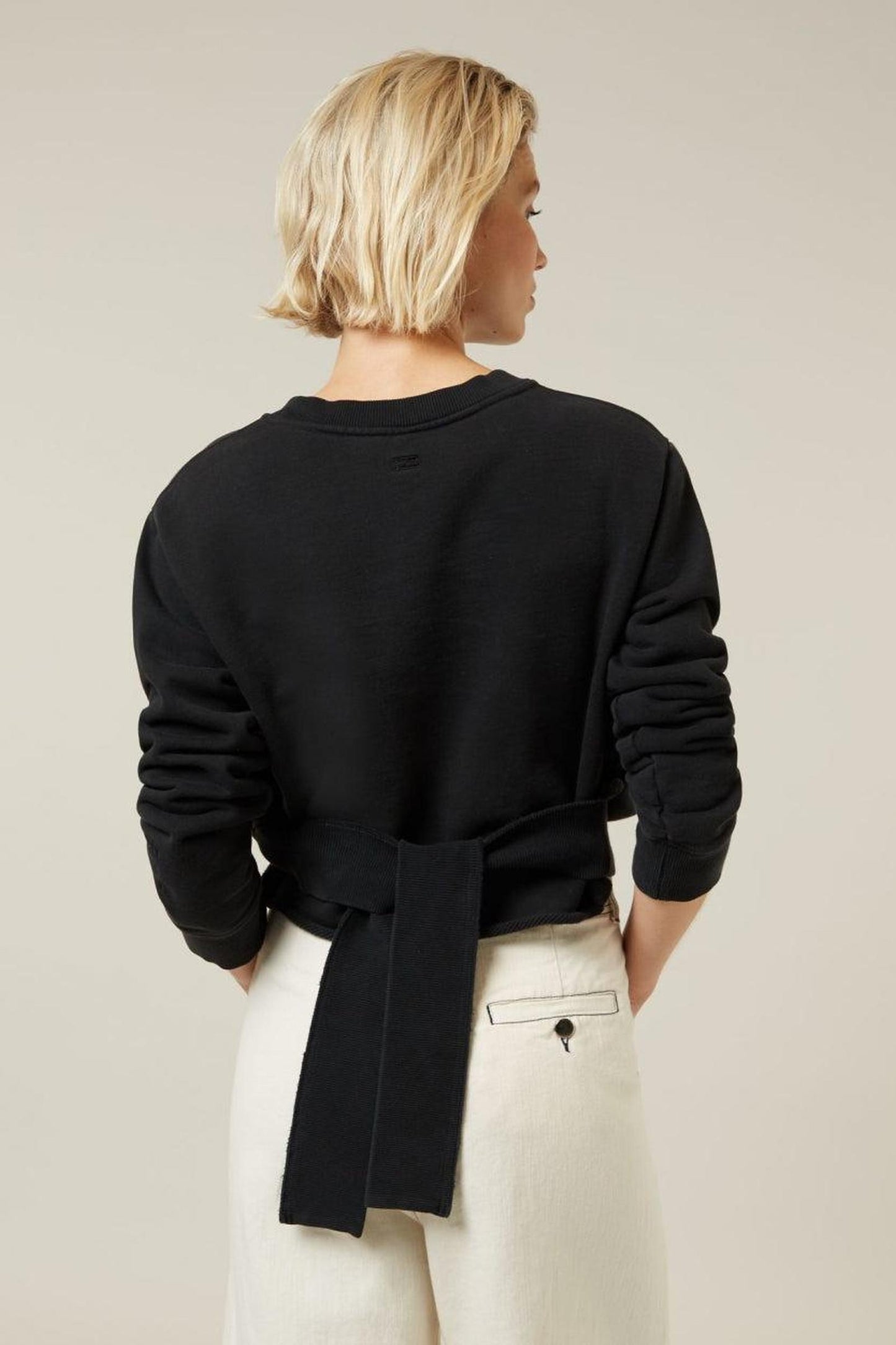 DECONSTRUCTED SWEATER