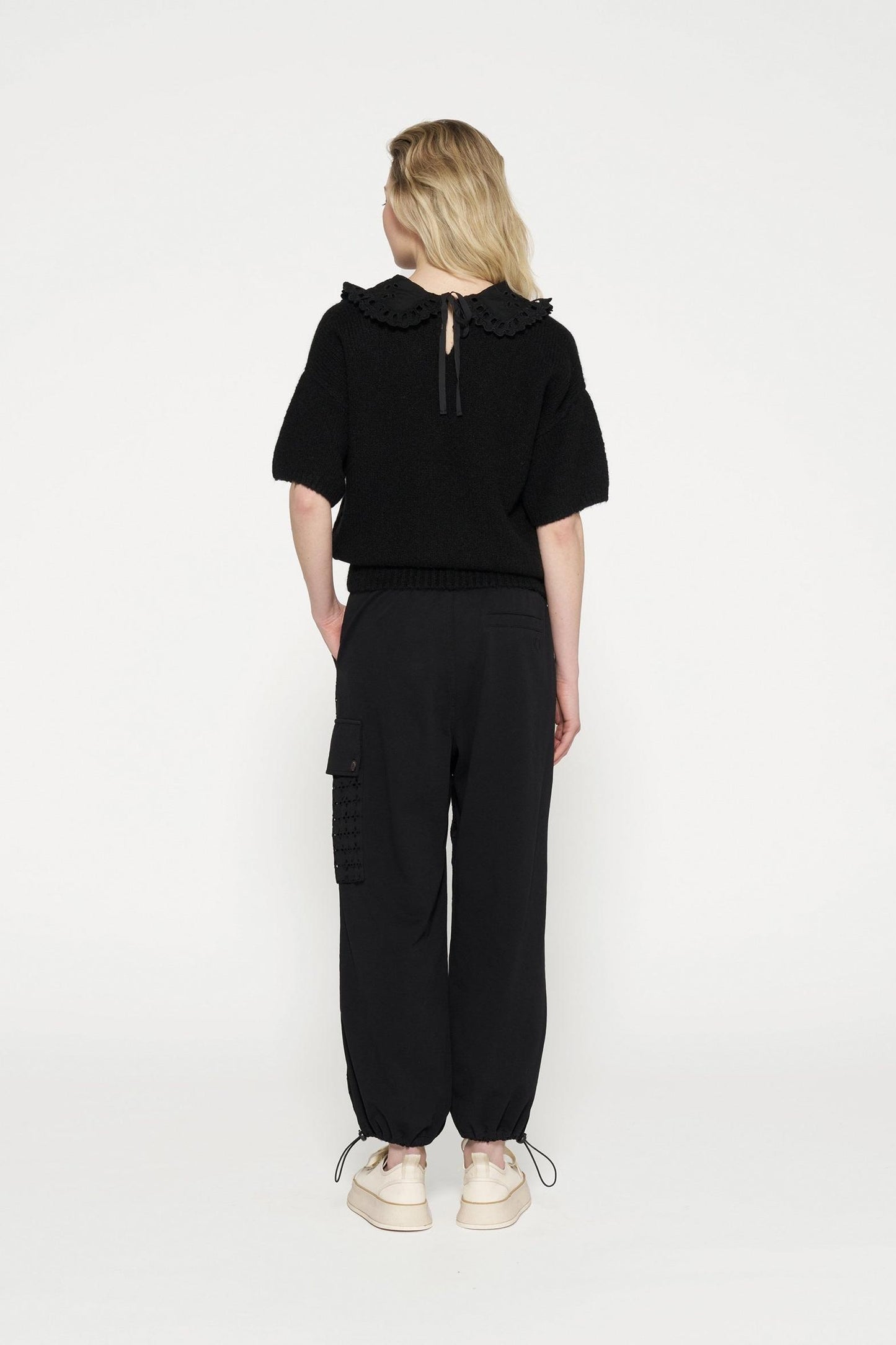 SHORT SLEEVE RUFFLE KNIT SWEATER