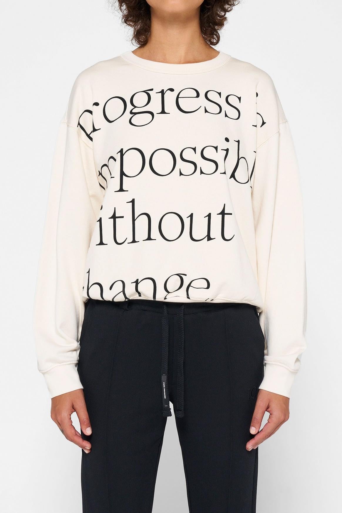 SWEATER TAGLINE