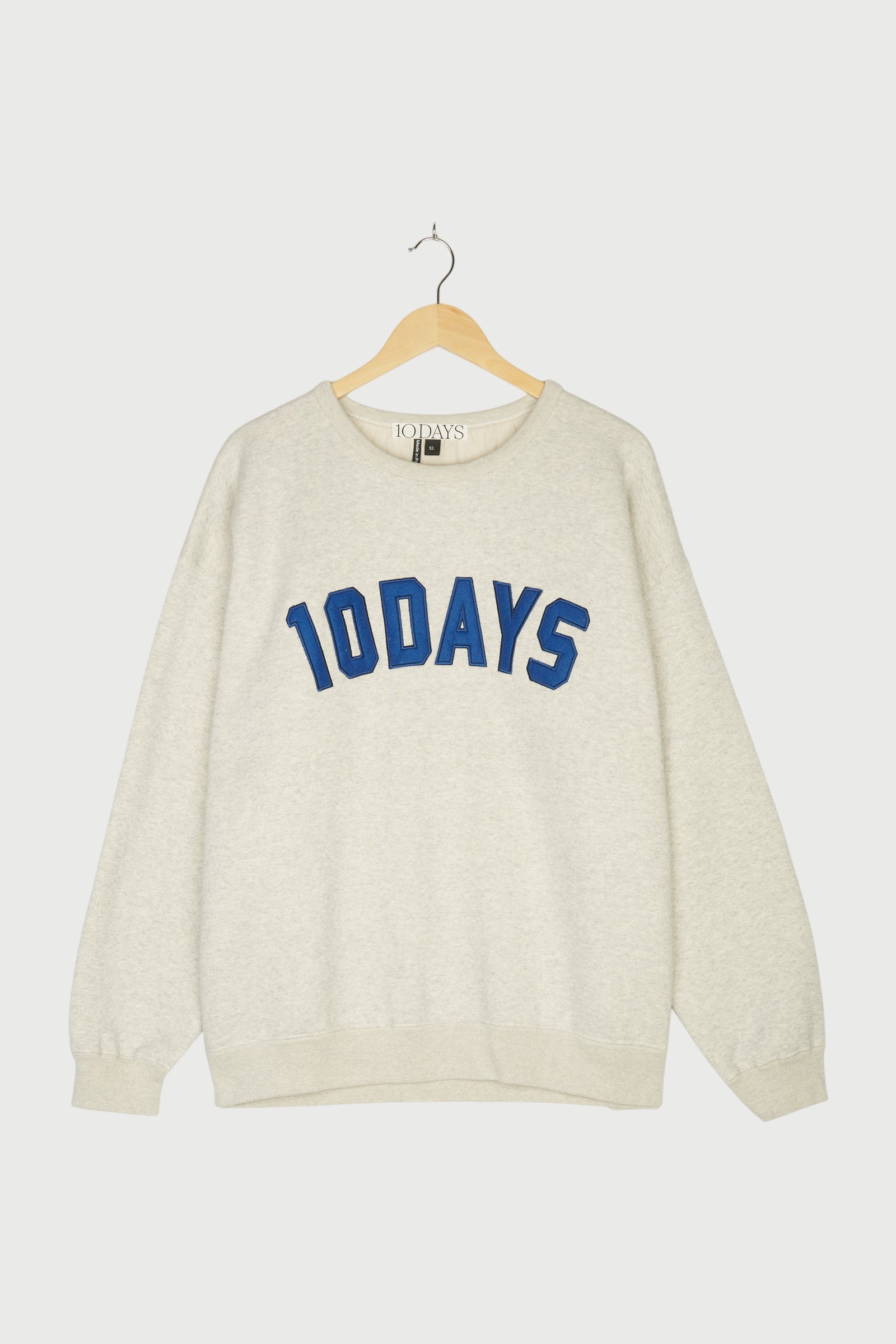 RAW EDGE STATEMENT SWEATER