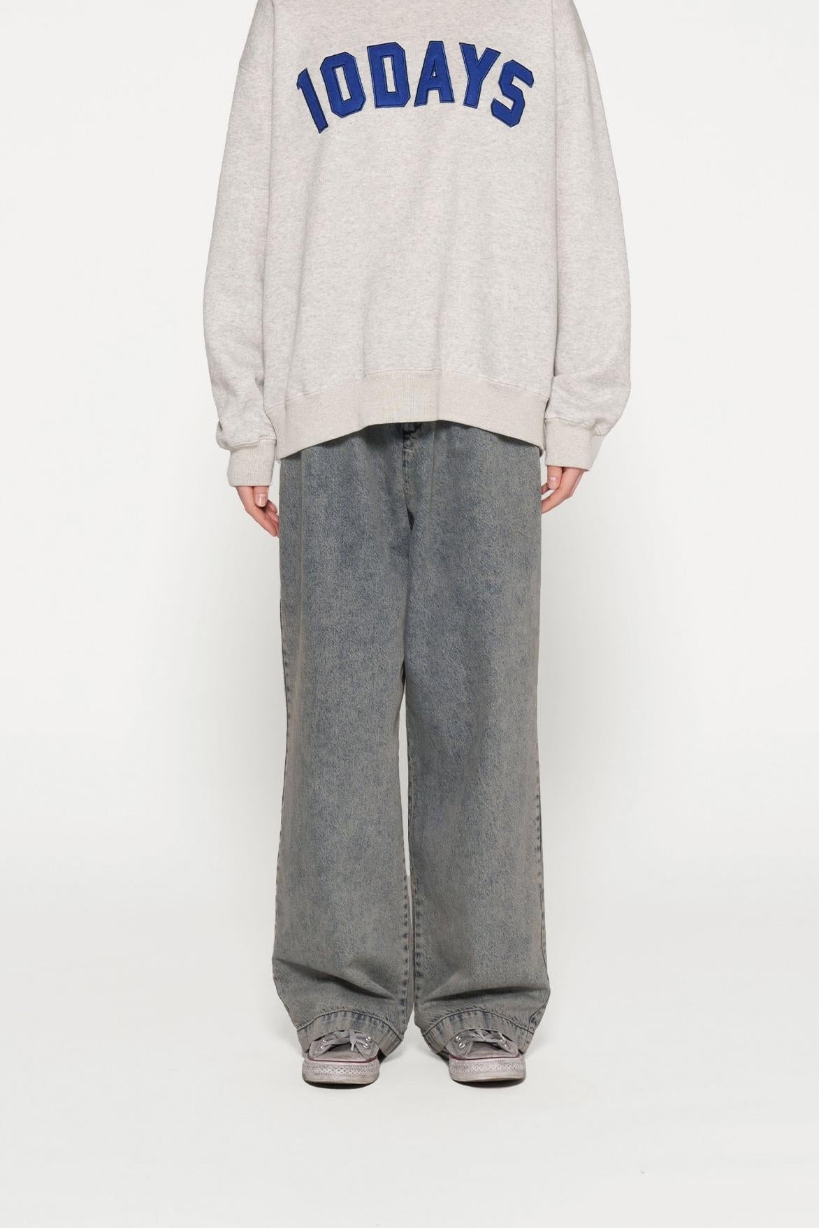 RAW EDGE STATEMENT SWEATER