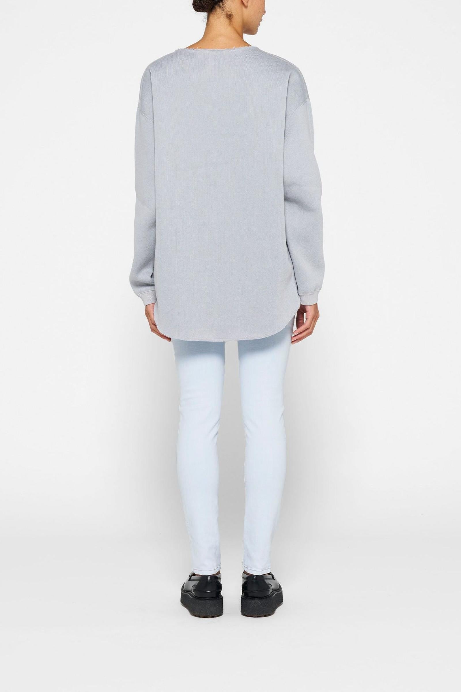 RAW EDGE STATEMENT SWEATER