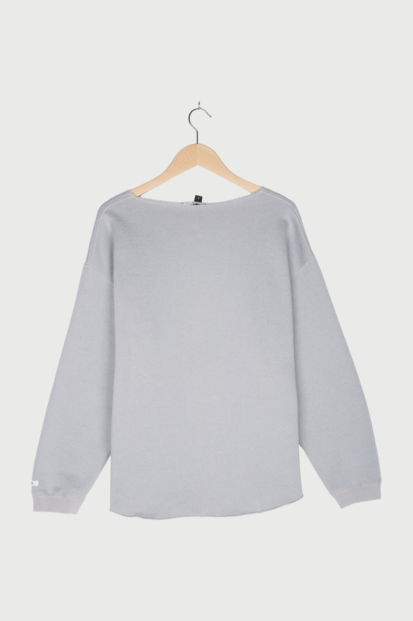 RAW EDGE STATEMENT SWEATER