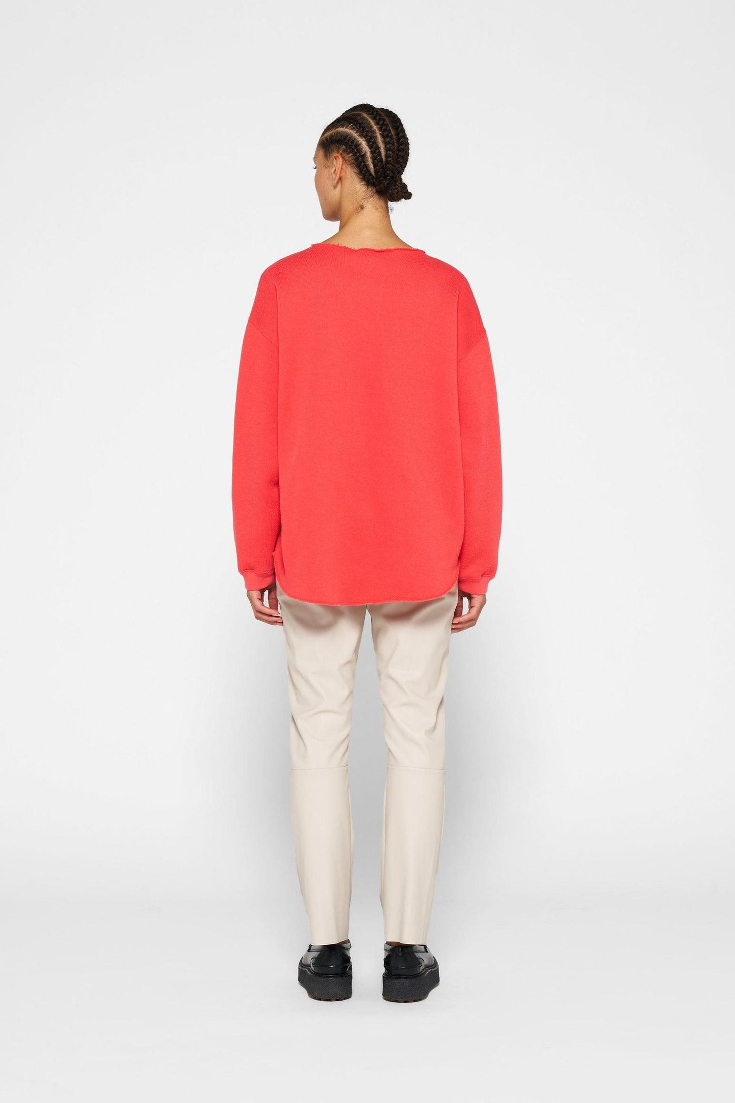 RAW EDGE STATEMENT SWEATER