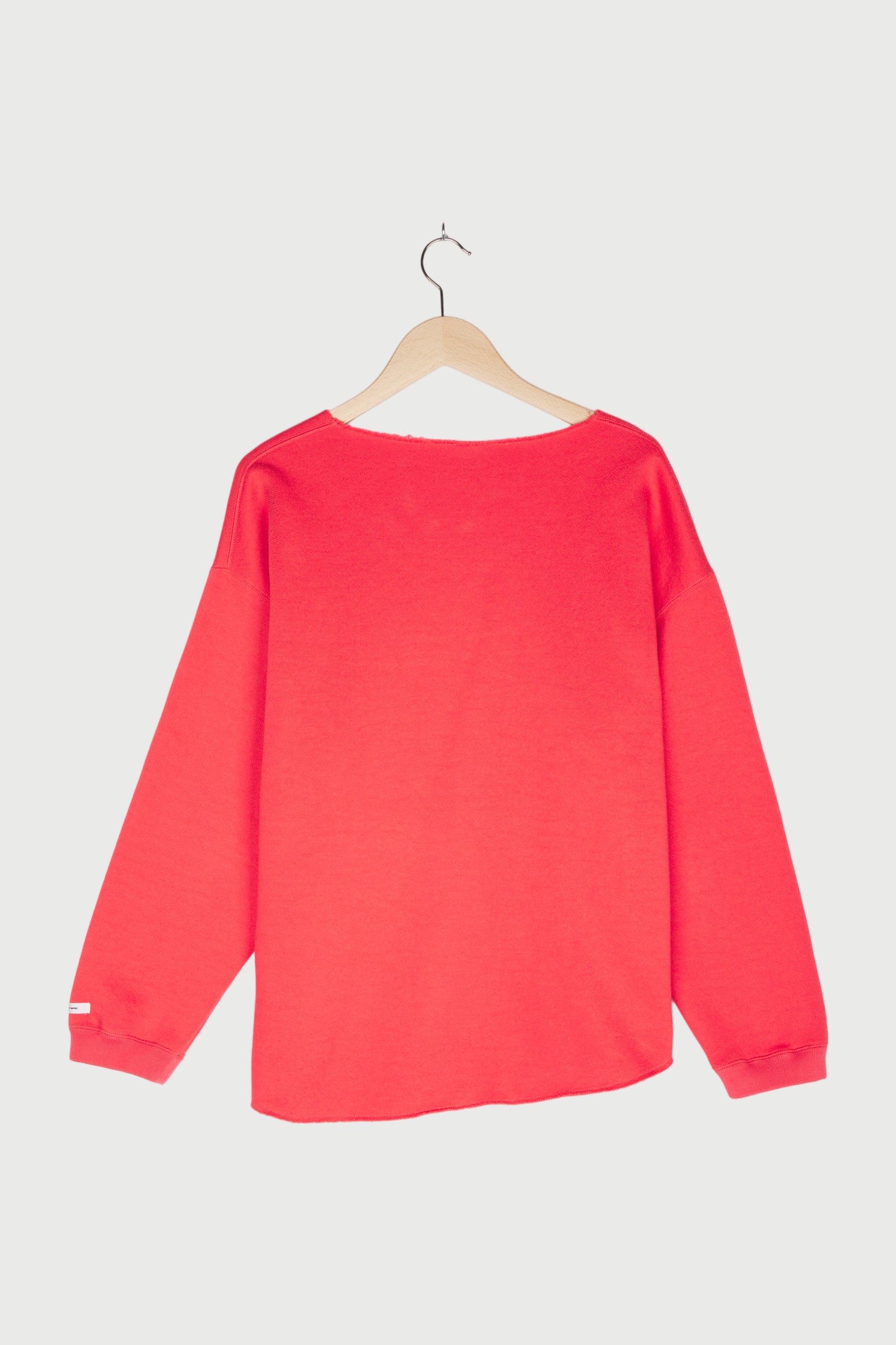 RAW EDGE STATEMENT SWEATER