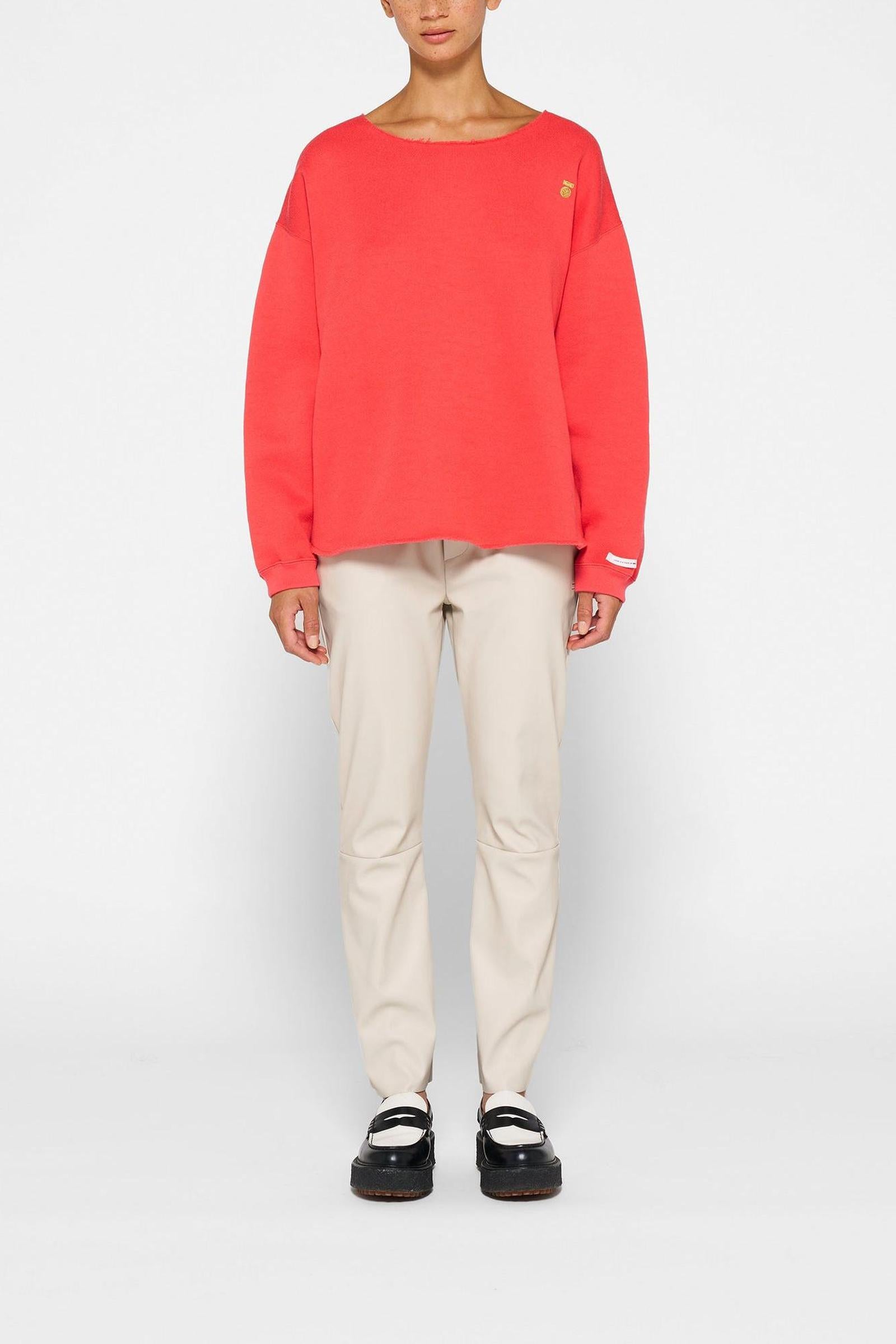 RAW EDGE STATEMENT SWEATER