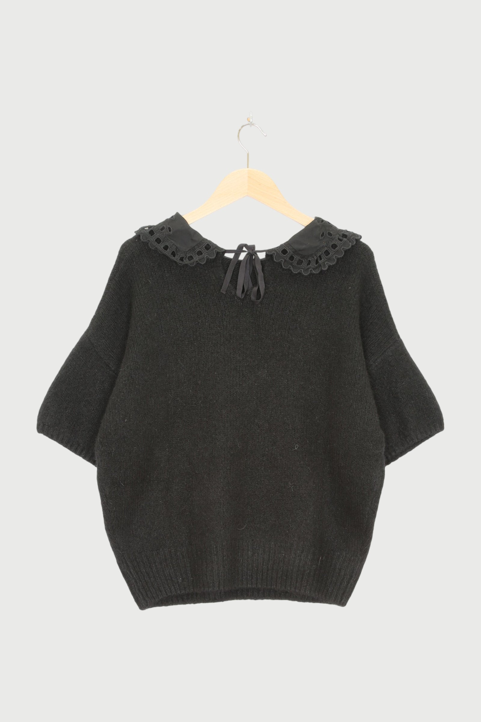 SHORT SLEEVE RUFFLE KNIT SWEATER