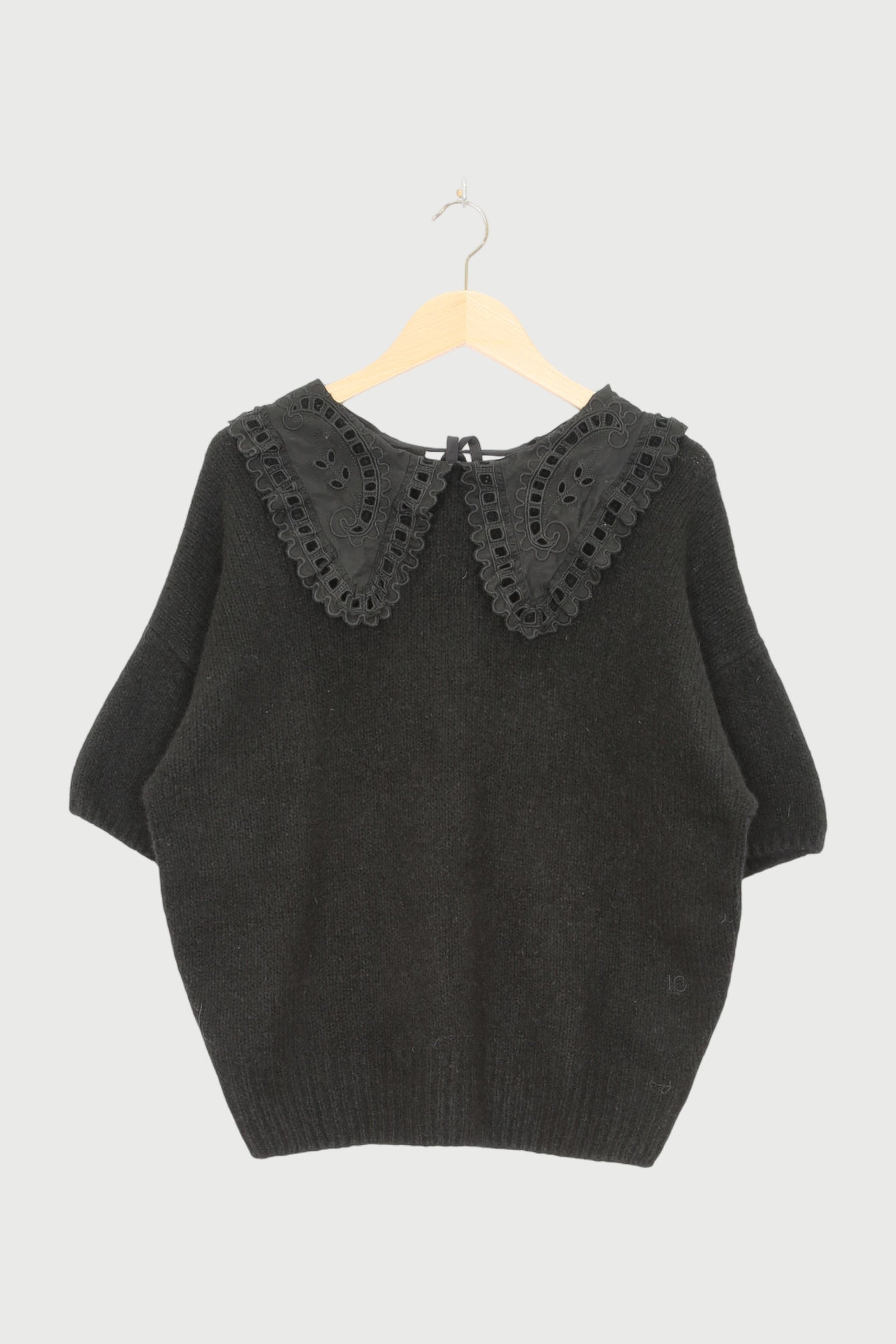 SHORT SLEEVE RUFFLE KNIT SWEATER